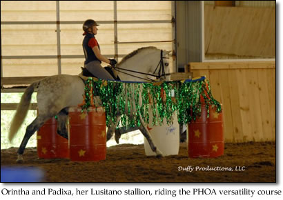 Orintha and Padixa, her Lusitano stallion, riding the PHOA versatility course